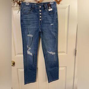 Distressed button down skinny jeans